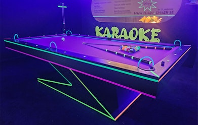 50% korting op Glowgolf, Pool en Karaoke bij Flash & Smash
