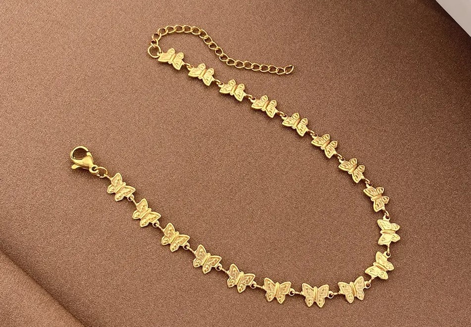 Goud vergulde armband met vlinders