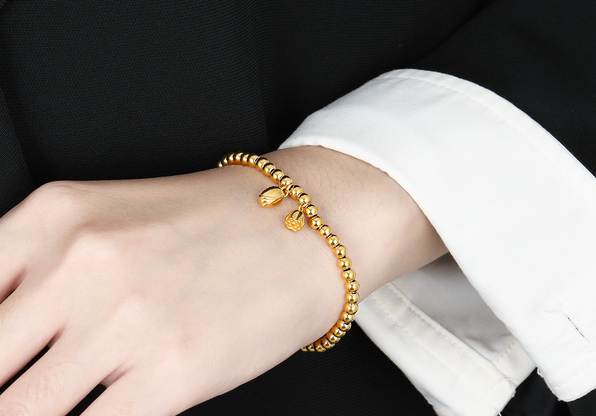 Bracelet Doré avec Boules et 2 Pendentifs