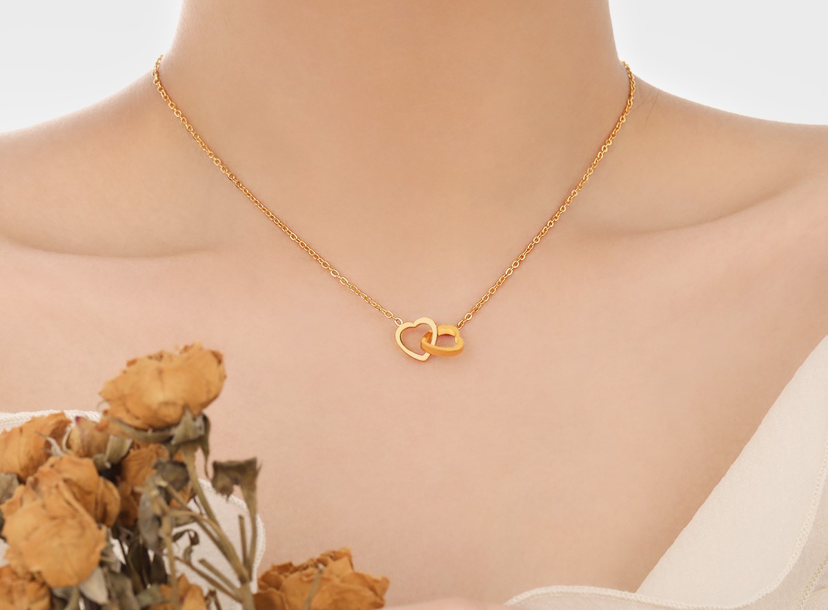 Trendy Goudkleurige Ketting met Dubbele Hartjes Hanger