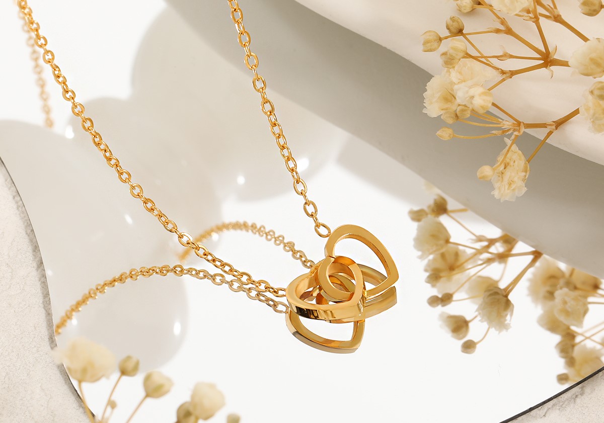 Trendy Goudkleurige Ketting met Dubbele Hartjes Hanger