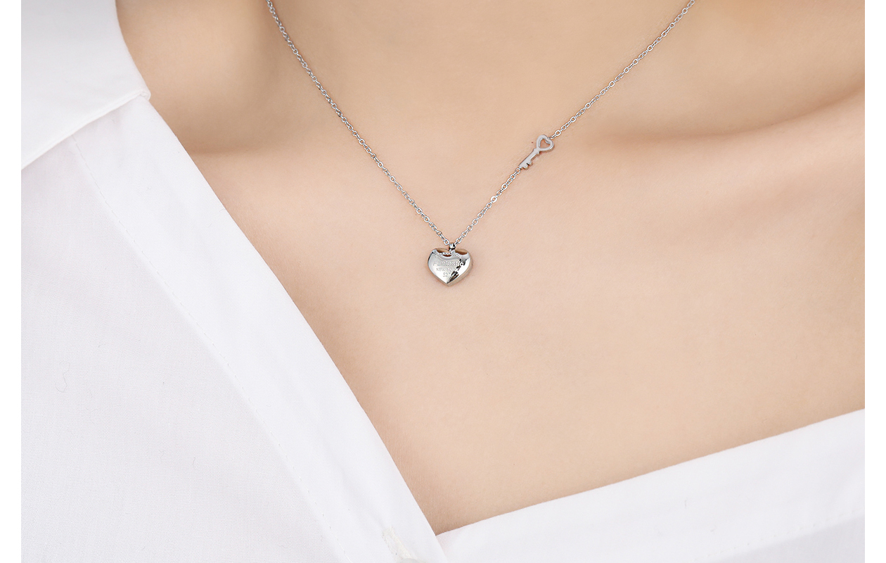 Zilveren ketting met hart en sleutel hanger