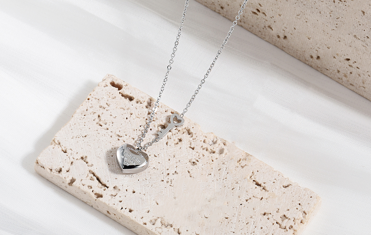 Zilveren ketting met hart en sleutel hanger