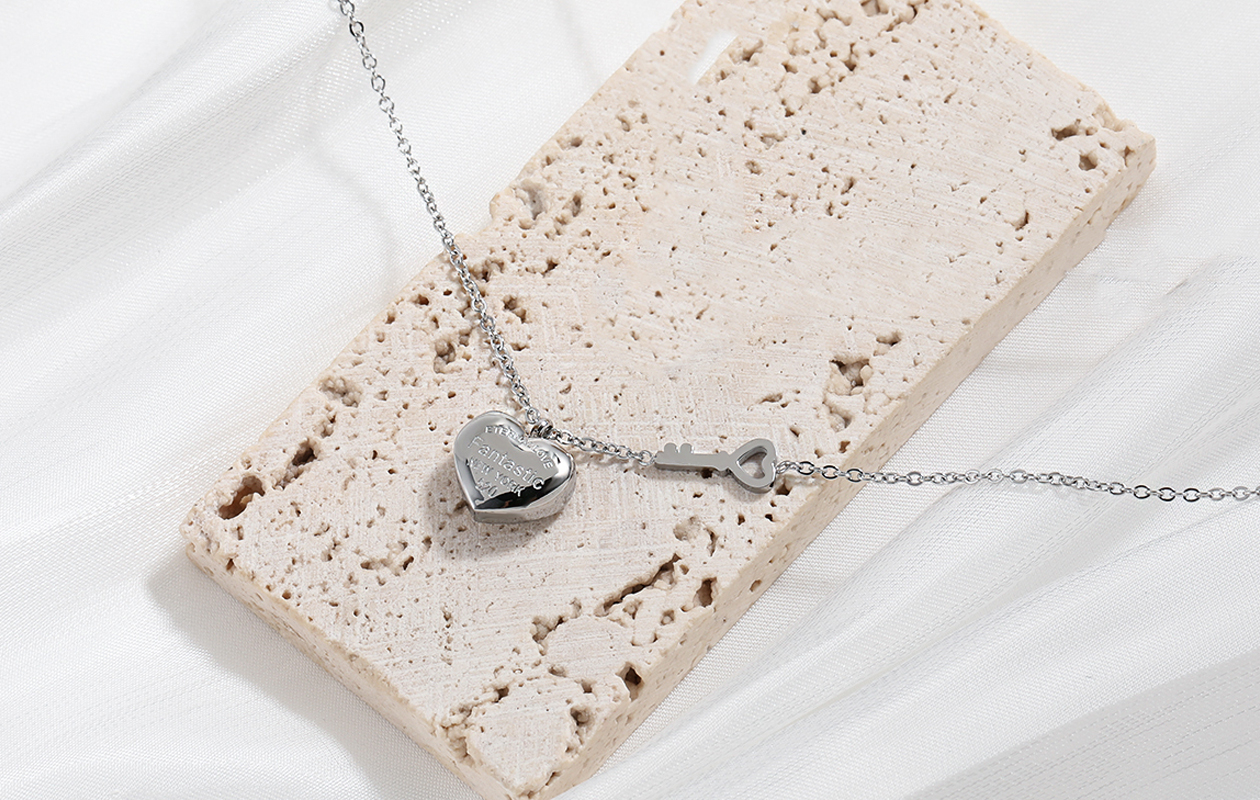 Zilveren ketting met hart en sleutel hanger