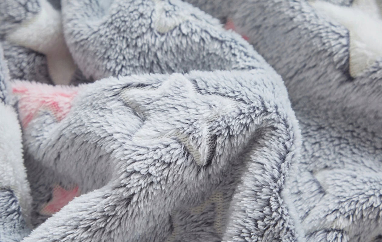 Blankglow fleecedeken met glow-in-the-dark sterren